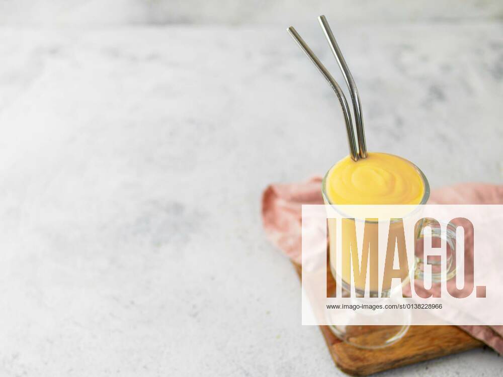Yellow milkshake with metal straws, sopy space, 13.10.2020,