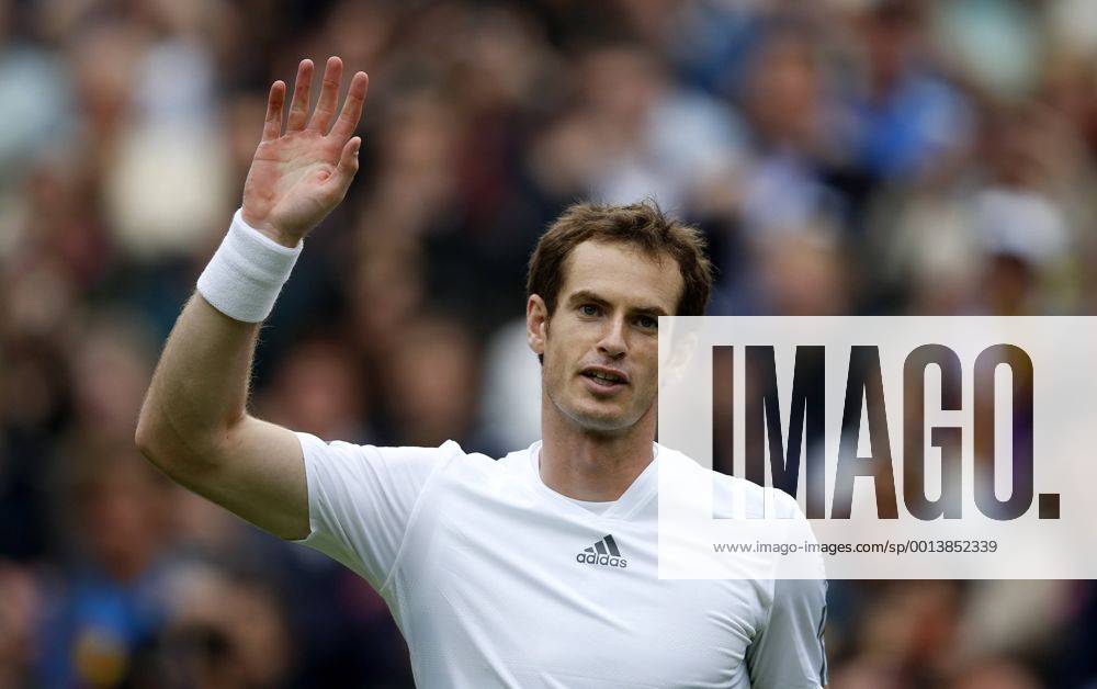 Andrew Andy Murray of Britain greets the spectators after the first round of the men s singles at the Wimbledon Lawn Tennis Championships in the All England Lawn Tennis and Croquet Club in London, Britain, on June 24, 2013. (Xinhua Wang Lili) (SP)BRITAIN-LONDON-TENNIS-WIMBLEDON