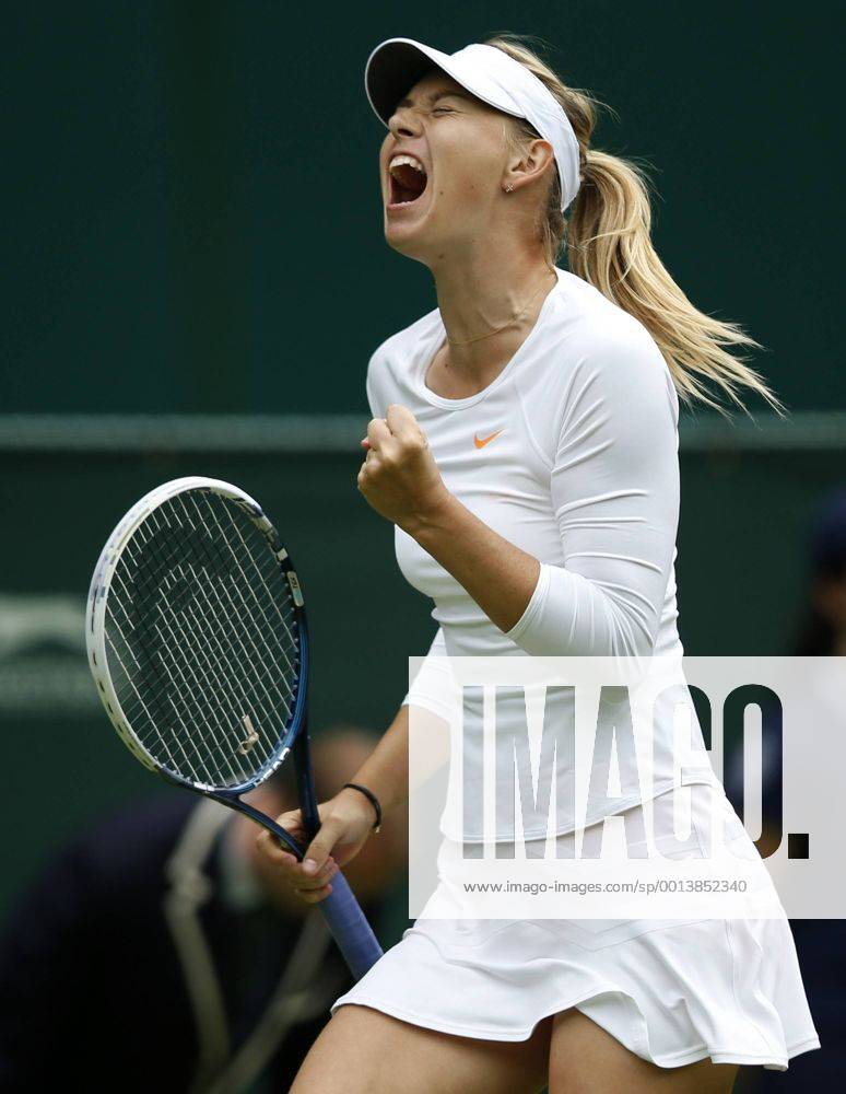 Maria Sharapova of Russia celebrates during the first round of the women s singles at the Wimbledon Lawn Tennis Championships in the All England Lawn Tennis and Croquet Club in London, Britain, on June 24, 2013. (Xinhua Wang Lili) (SP)BRITAIN-LONDON-TENNIS-WIMBLEDON