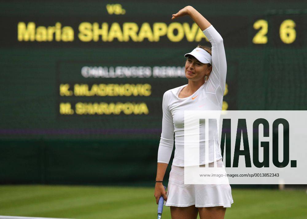 Maria Sharapova of Russia greets the spectators after the first round of the women s singles at the Wimbledon Lawn Tennis Championships in the All England Lawn Tennis and Croquet Club in London, Britain, on June 24, 2013. (Xinhua Yin Gang) (SP)BRITAIN-LONDON-TENNIS-WIMBLEDON