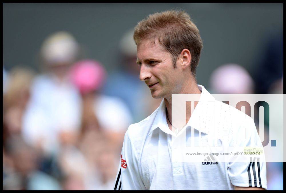 Florian Mayer on Centre Court at the Wimbledon Tennis Championships. Tuesday, 25th June 2013 AndrewxParsonsx xi-Images IIM-0142-0075