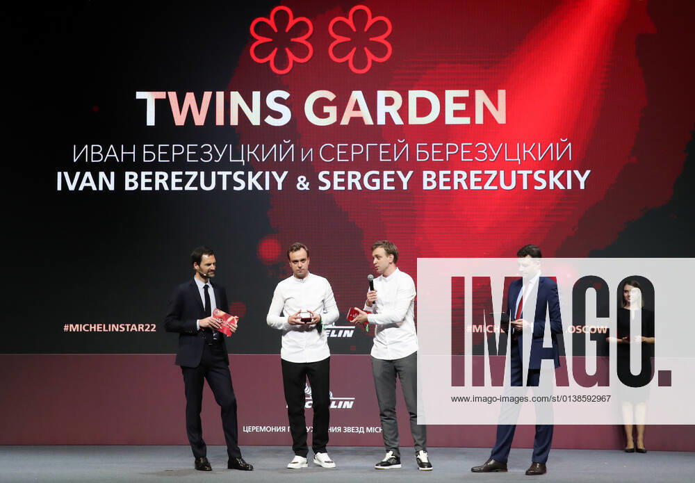 Michelin Guides International Director Gwendal Poullennec, Twins Garden brother chefs Ivan and Sergei Berezutsky receiving two Michelin stars, and journalist Sergei Krasnov (L-R) attend a ceremony held at the Zaryadye Concert Hall to award Michelin stars to Moscow restaurants and chefs as well as to introduce the first Michelin Guide to Moscow. Vyacheslav Prokofyev TASS TS1143D2