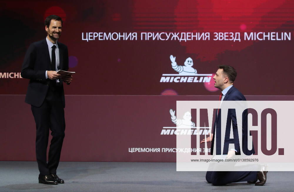 Michelin Guides International Director Gwendal Poullennec (L) and journalist Sergei Krasnov attend a ceremony held at the Zaryadye Concert Hall to award Michelin stars to Moscow restaurants and chefs as well as to introduce the first Michelin Guide to Moscow. Vyacheslav Prokofyev TASS TS1143D5