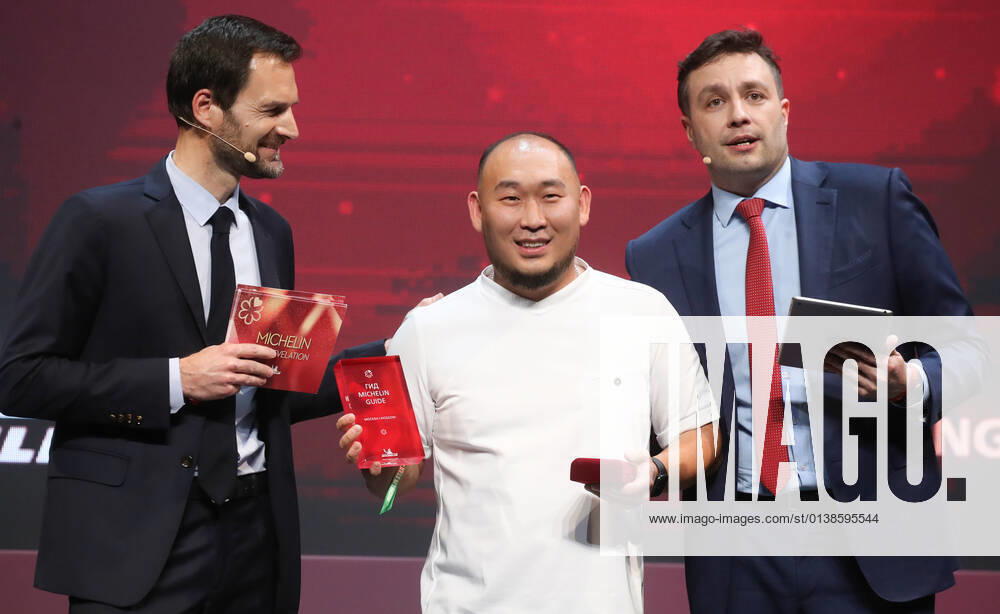 Michelin Guides International Director Gwendal Poullennec, Sakhalin chef Alexei Kogai, and journalist Sergei Krasnov (L-R) attend a ceremony held at the Zaryadye Concert Hall to award Michelin stars to Moscow restaurants and chefs as well as to introduce the first Michelin Guide to Moscow. Vyacheslav Prokofyev TASS TS1143EC