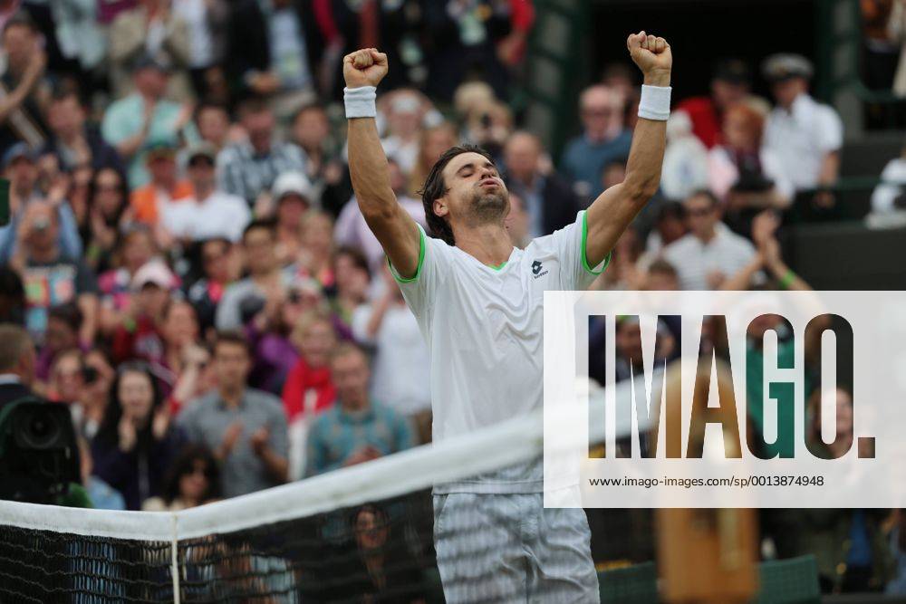 Spain s David Ferrer celebrates his victory on day five of the 2013 Wimbledon Championships in London on June 28, 2013. LON2013062816