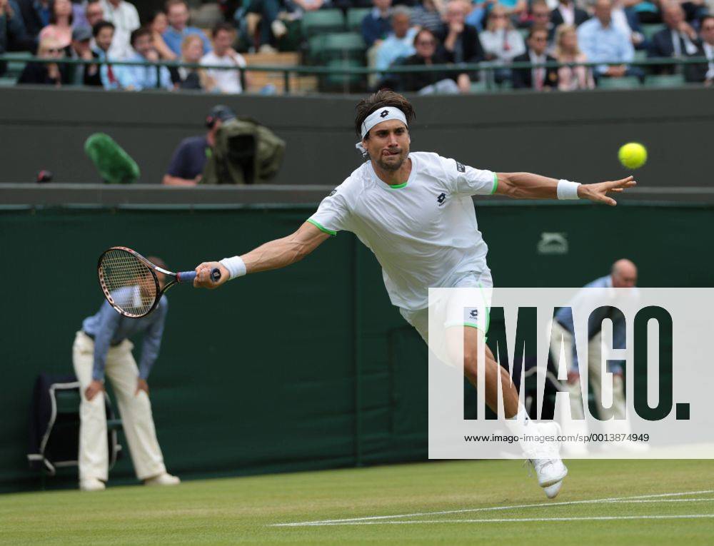 Spain s David Ferrer runs for the ball in his on day five of the 2013 Wimbledon Championships in London on June 28, 2013. LON2013062822