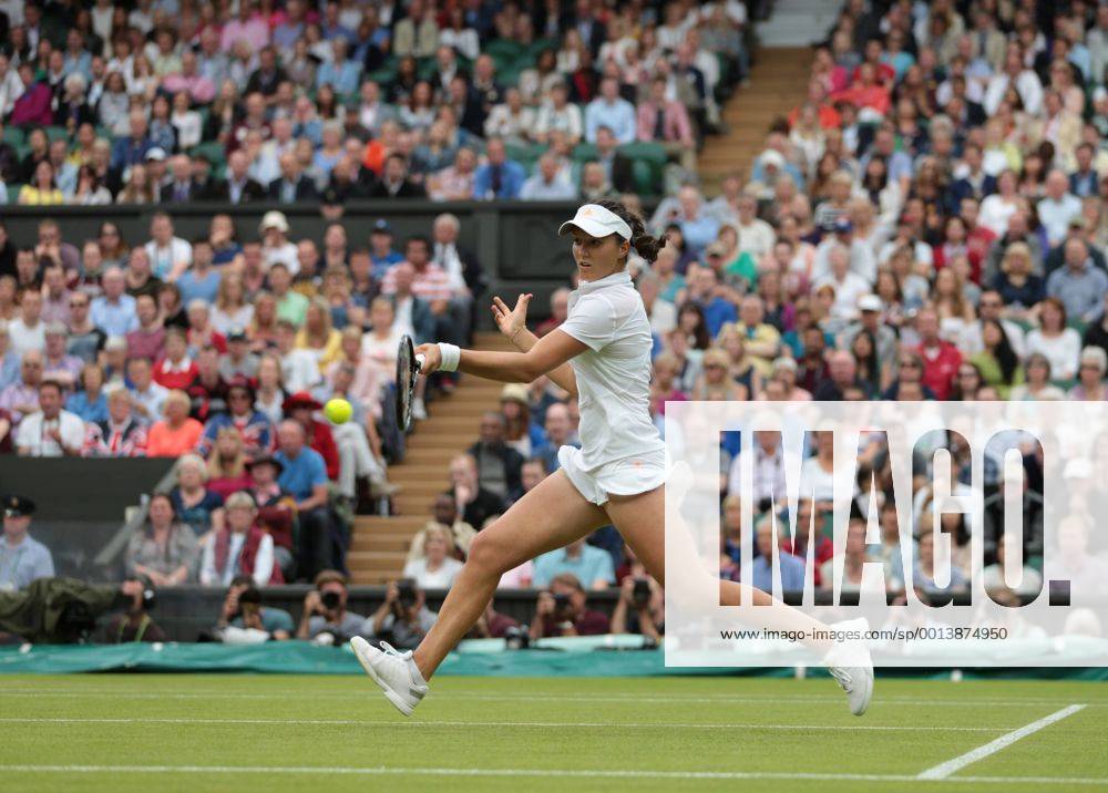 England s Laura Robson returns in her match on day five of the 2013 Wimbledon Championships in London on June 28, 2013. LON2013062824