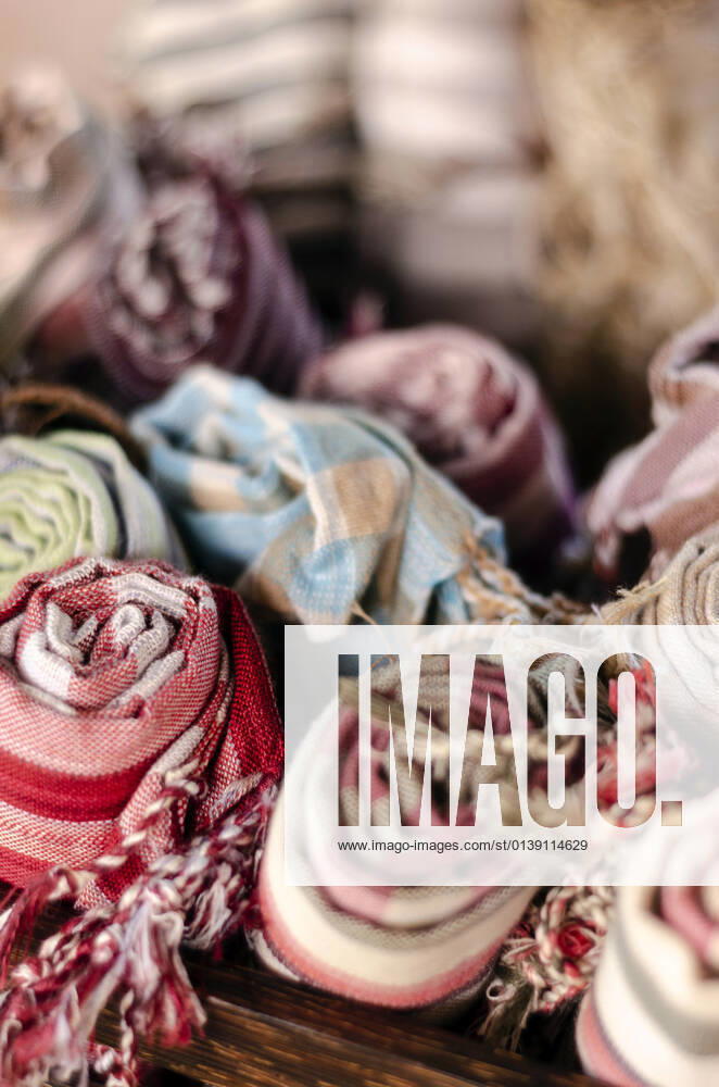 Mixed traditional krama cotton scarf souvenirs detail on display at shop in angkor wat in cambodia Siem Reap Cambodia