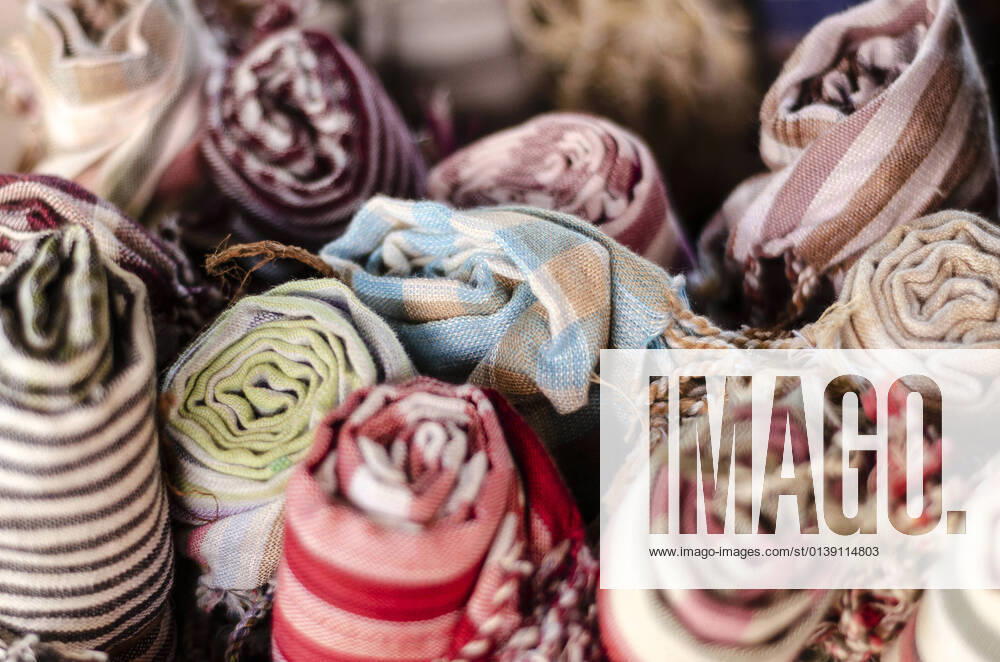 Mixed traditional krama cotton scarf souvenirs detail on display at shop in angkor wat in cambodia Siem Reap Cambodia