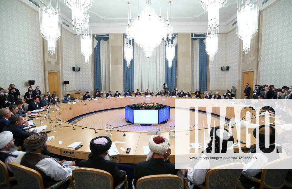 Russia Afghanistan Moscow Format Meeting 6676291 20.10.2021 In this handout photo released by the Russian Foreign Ministry, Russian presidential envoy to Afghanistan Zamir Kabulov, Taliban officials take part in the Moscow-format meeting on Afghanistan attended by representatives of 10 countries and a delegation of the Taliban movement (banned as a terrorist organization in Russia), in Moscow, Russia. Editorial use only, no archive, no commercial use. Alexey Kudenko Sputnik Moscow Russia