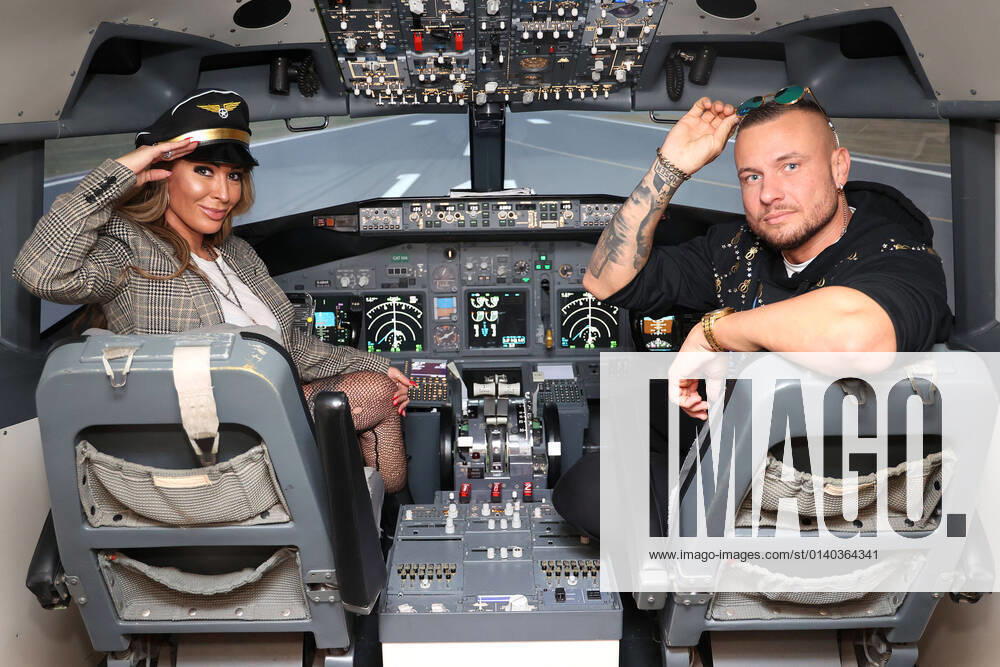 Cora Schumacher and Eric Sindermann at the photo session in a flight simulator at the historic airport on 27 10 2021 at Motorworld Cologne Heavenly outing for Cora Schumacher in Cologne