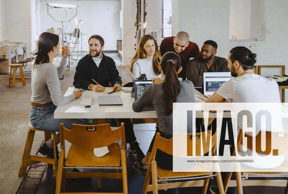 Computer programmers discussing in meeting at startup company Germany, Berlin, model released, property released