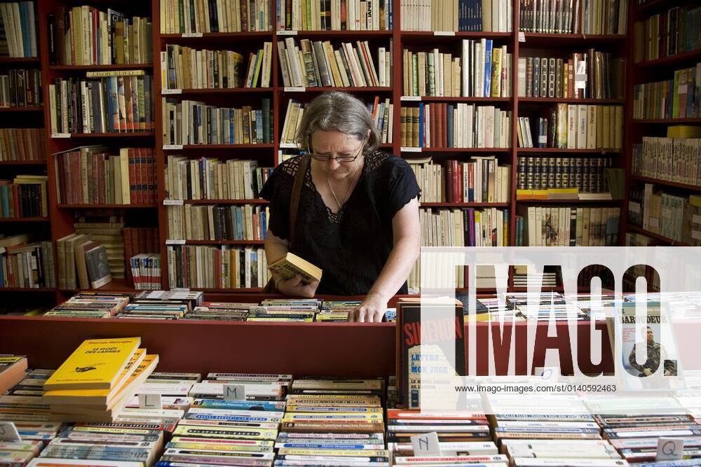 Woman in bookshop, Book village Redu, Ardennes, Book, Books, Belgium, Europe