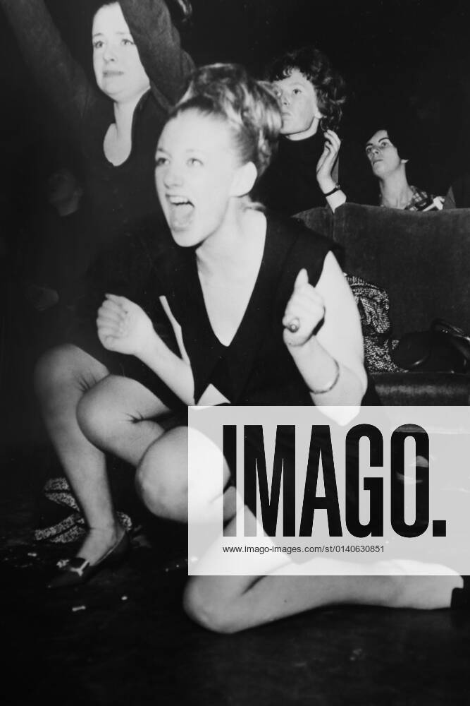 Fans of The Beatles scream during a concert in the early Sixties. Unknown, Unknown, UK, Ref:VM SHO Beatles fans.jpg, The Beatles, fans, concert, screaming