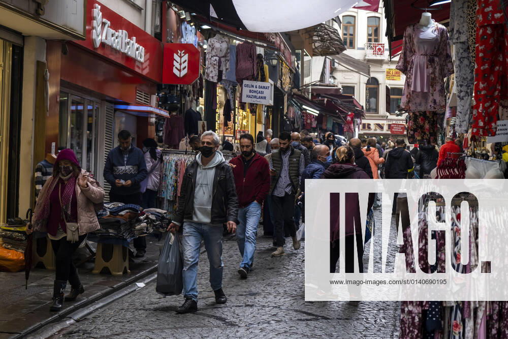 People wearing face masks walk on a street in Istanbul, Turkey, on November 1, 2021. Turkey confirmed 28,678 new COVID-19 cases, raising its tally of infections to 8,061,666 according to its health ministry. Some 217 persons died of Covid-9 today, increasing the death toll from the virus in Turkey to 70,828. (