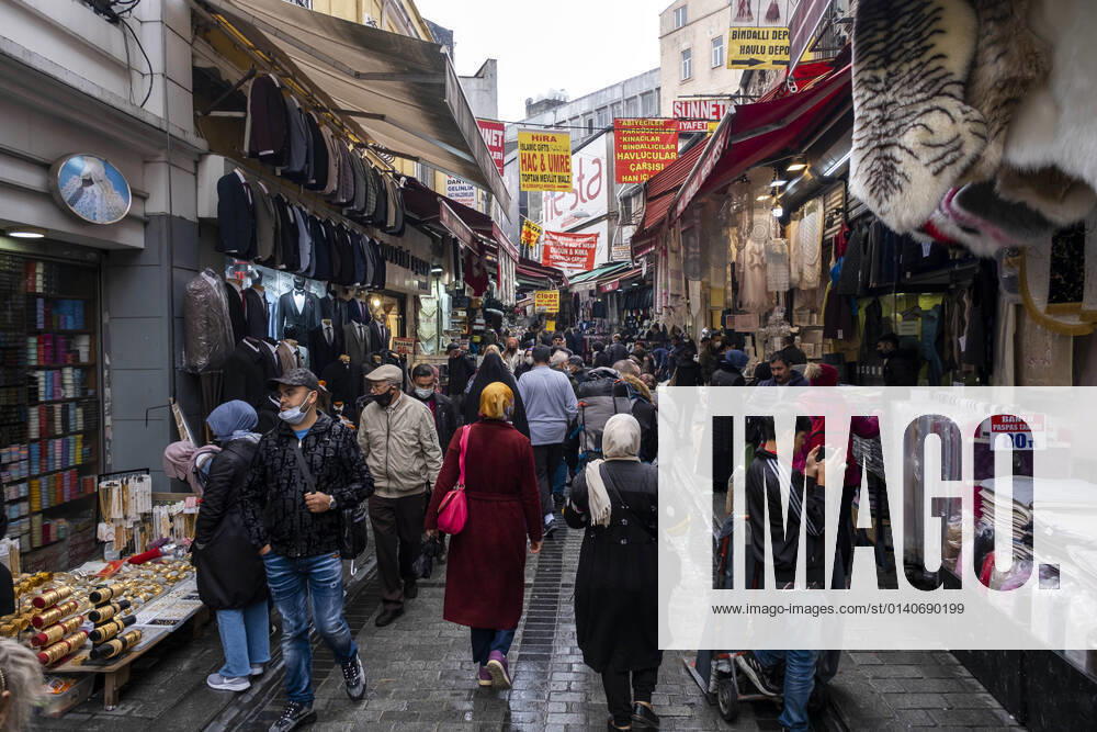 People wearing face masks walk on a street in Istanbul, Turkey, on November 1, 2021. Turkey confirmed 28,678 new COVID-19 cases, raising its tally of infections to 8,061,666 according to its health ministry. Some 217 persons died of Covid-9 today, increasing the death toll from the virus in Turkey to 70,828. (