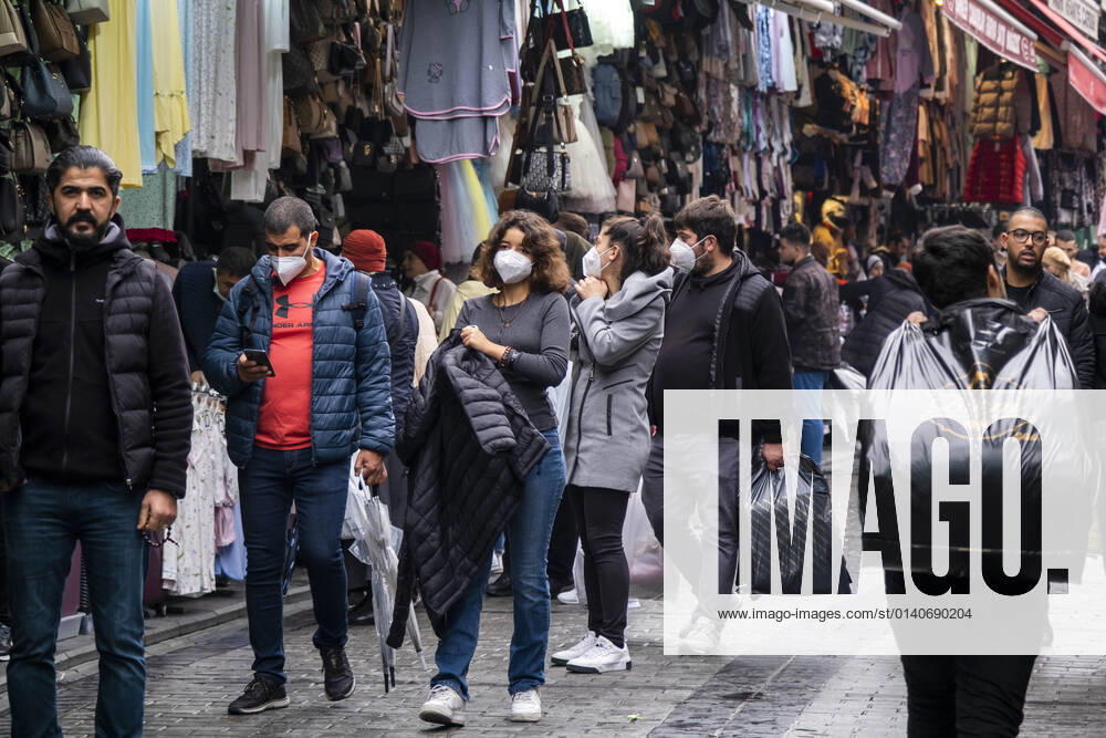 People wearing face masks walk on a street in Istanbul, Turkey, on November 1, 2021. Turkey confirmed 28,678 new COVID-19 cases, raising its tally of infections to 8,061,666 according to its health ministry. Some 217 persons died of Covid-9 today, increasing the death toll from the virus in Turkey to 70,828. (