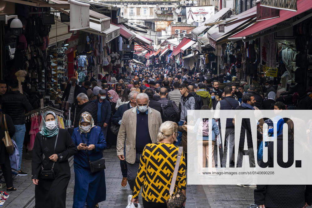 People wearing face masks walk on a street in Istanbul, Turkey, on November 1, 2021. Turkey confirmed 28,678 new COVID-19 cases, raising its tally of infections to 8,061,666 according to its health ministry. Some 217 persons died of Covid-9 today, increasing the death toll from the virus in Turkey to 70,828. (