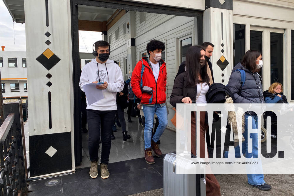 People wearing face masks walk on a street in Istanbul, Turkey, on November 1, 2021. Turkey confirmed 28,678 new COVID-19 cases, raising its tally of infections to 8,061,666 according to its health ministry. Some 217 persons died of Covid-9 today, increasing the death toll from the virus in Turkey to 70,828. (Safak Hacaloglu - Depo Photos)