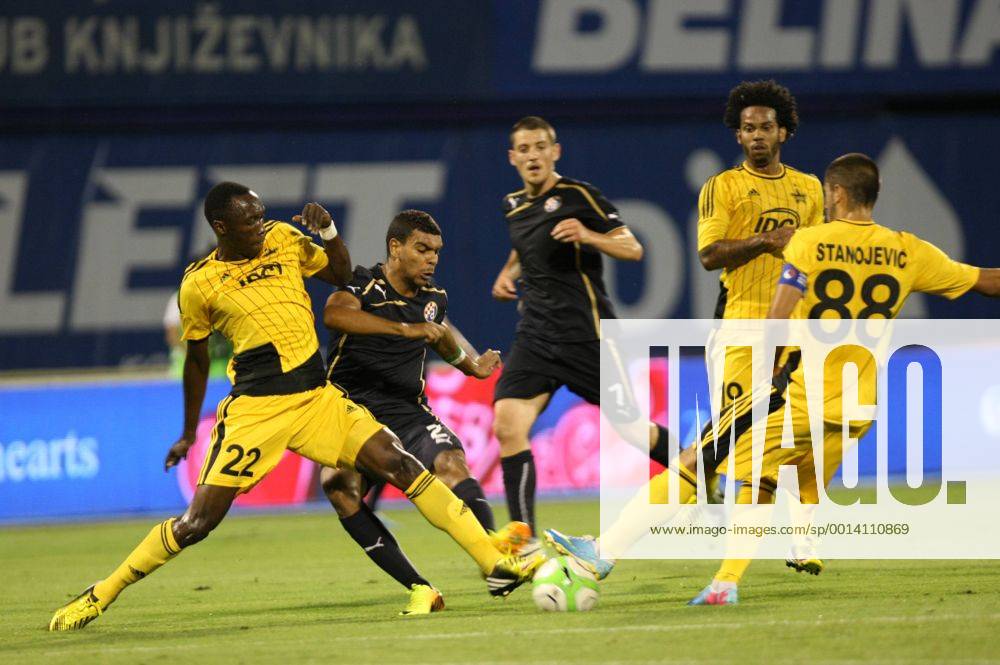 Zagreb, 30.7.2013. - UEFA Champions League 2013 2014, Third Qualifying Round, Stadium Maksimir. GNK Dinamo (blue) - FC Sheriff (yellow). El Arabi Hilal Soudani vs Djibril Tamsir Paye and Marko Stanojevic GNK Dinamo - FC Sheriff