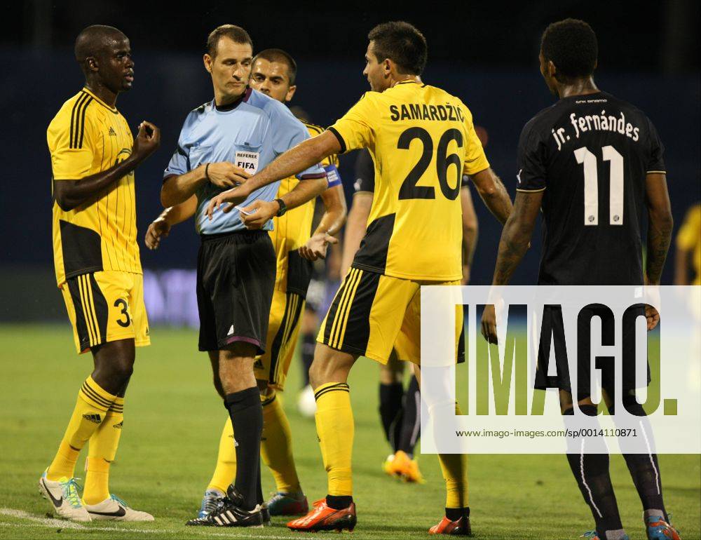 Zagreb, 30.7.2013. - UEFA Champions League 2013 2014, Third Qualifying Round, Stadium Maksimir. GNK Dinamo (blue) - FC Sheriff (yellow). Carlos Clos Gomes and William Celestino Da Silva, Miral Samardzic GNK Dinamo - FC Sheriff