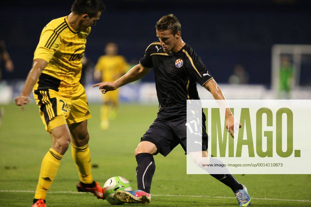 Zagreb, 30.7.2013. - UEFA Champions League 2013 2014, Third Qualifying Round, Stadium Maksimir. GNK Dinamo (blue) - FC Sheriff (yellow). Said Husejinovic vs Miral Samardzic GNK Dinamo - FC Sheriff