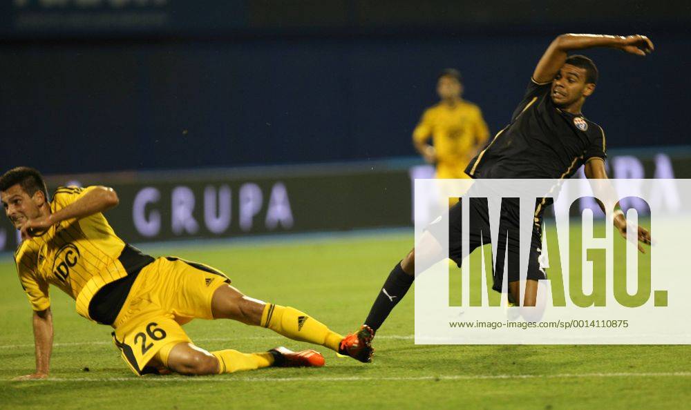 Zagreb, 30.7.2013. - UEFA Champions League 2013 2014, Third Qualifying Round, Stadium Maksimir. GNK Dinamo (blue) - FC Sheriff (yellow). El Arabi Hilal Soudani vs Miral Samardzic GNK Dinamo - FC Sheriff
