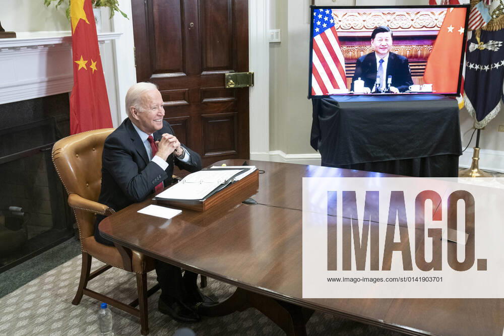 President Joe Biden listens during a virtual summit with Chinese President Xi Jinping in the Roosevelt Room of the White House in Washington DC on Monday, November 15, 2021. WAP202111155217 SARAHxSILBIGER
