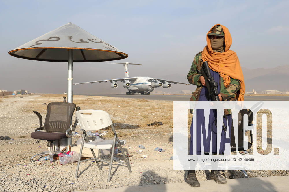 KABUL, AFGHANISTAN – NOVEMBER 18, 2021: A member of the Taliban movement (banned in Russia) seen at Kabul airport where an Ilyushin Il-76 airlifter of the Russian Aerospace Forces has delivered humanitarian aid. After the USA withdrew its troops from Afghanistan, the Taliban movement (banned in Russia) gained full control over Afghanistan on September 6; on September 7, they announced an interim government. Valery Sharifulin TASS TS118499