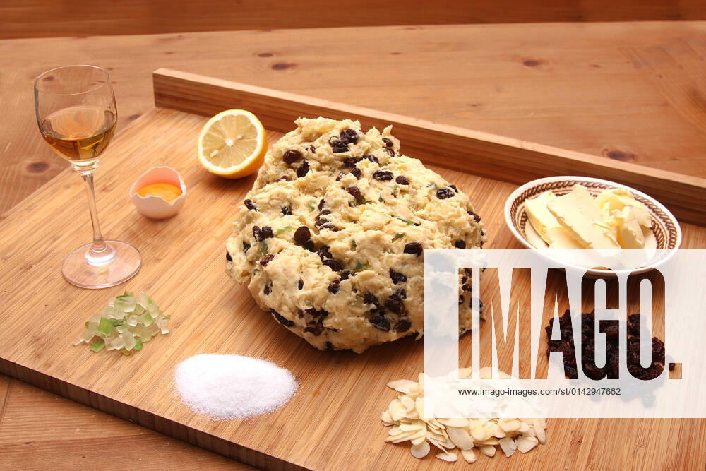 Dough and ingredients for the christmas stollen 1033003308