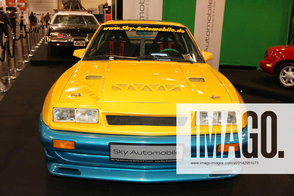 Opel Manta Manta B with Mattig Breitbau Tuning Kit, year 1983, film car from Manta Manta, color yellow blue special show film cars Auto Stars, 39 Classic Prestige Salon S I H A in the context of the 53 Essen Motor Show 2021 27 11 05 12 2021, press day 26 11 2021 , car, car show, exhibition for sporty cars tuning motor sports and classic cars, Messe Essen, Essen D