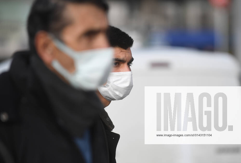 People wearing face masks walk on a street in Ankara, Turkey, on November 28, 2021. Turkey confirmed 21,655 new COVID-19 cases, raising its tally of infections to 8,746,055 according to its health ministry. Some 213 persons died of Covid-9 today, increasing the death toll from the virus in Turkey to 76,446. (