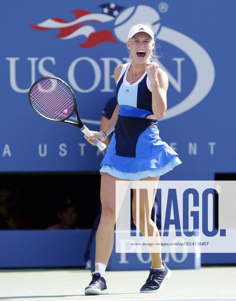 Caroline Wozniacki of Denmark in Arthur Ashe Stadium in their first round match in day two at the U.S. Open Tennis Championships at the USTA BillieJeanKing National Tennis Center in New York City on August 27, 2013. NYP20130827126