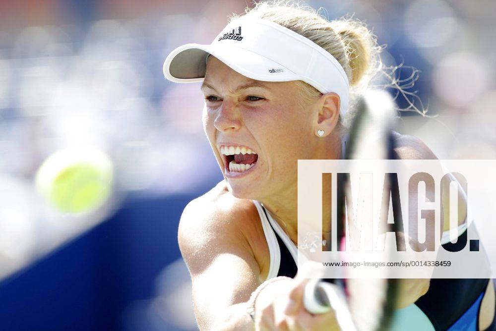 Caroline Wozniacki of Denmark hits a backhand in her straight sets victory in the first round match in day two at the U.S. Open Tennis Championships at the USTA BillieJeanKing National Tennis Center in New York City on August 27, 2013. NYP20130827123