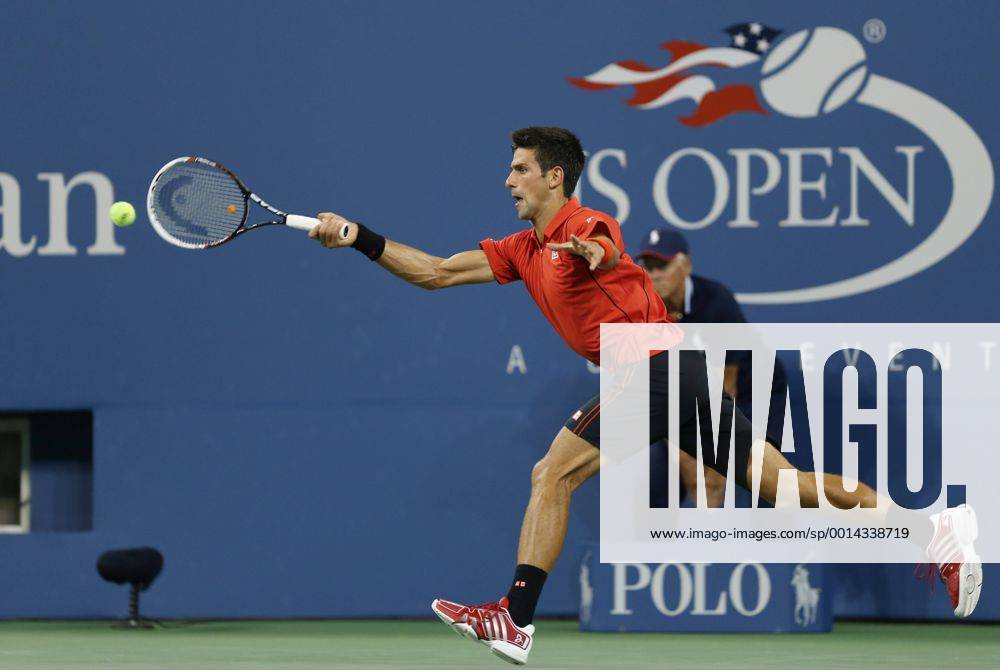 Novak Djokovic of Serbia returns a shot during the men s singles first round match at the U.S. Open tennis championships in New York, Aug. 27, 2013. (Xinhua Fang Zhe) (SP)U.S.-NEW YORK-TENNIS-U.S. OPEN-DJOKOVIC