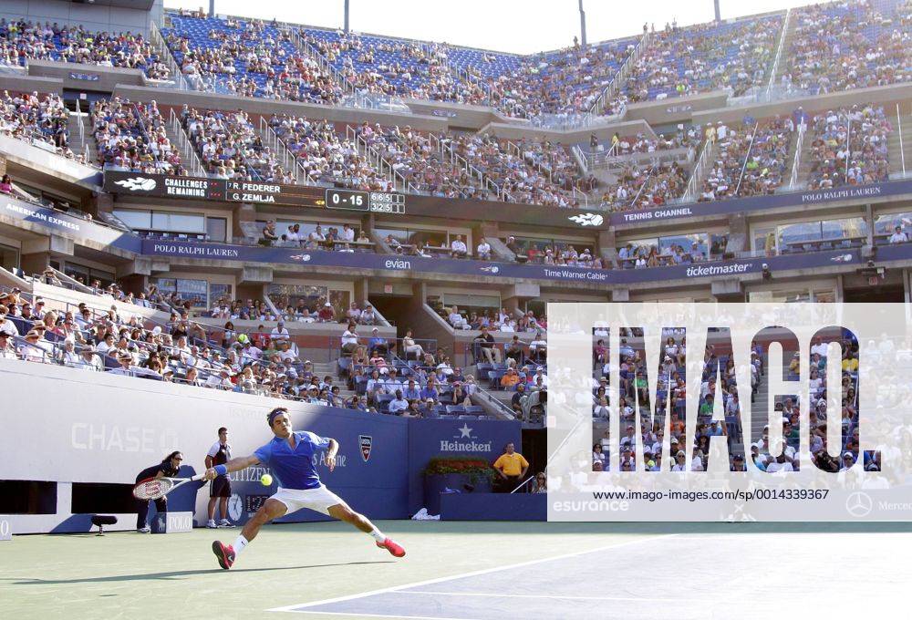 Roger Federer of returns a ball in the first round match in Arthur Ashe Stadium on day two at the U.S. Open Tennis Championships at the USTA BillieJeanKing National Tennis Center in New York City on August 27, 2013. NYP20130827130