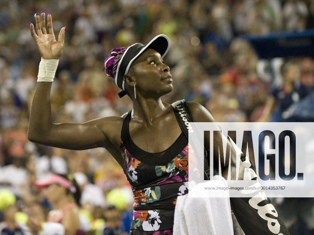 Venus Williams waves to fans after loosing to Jie Zheng of China in the second round during the US Open Tennis Championships at the Billie Jean King National Tennis Center in Flushing, New York. TENNIS: AUG 28 US Open Icon20140782