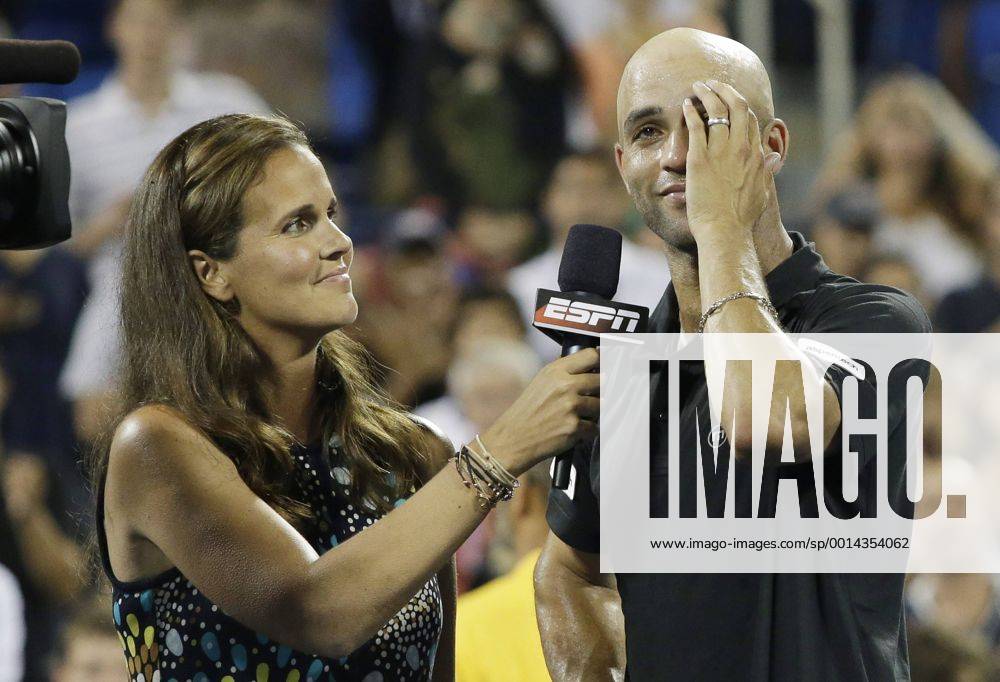James Blake reacts as he speaks to Mary Joe Fernandez on the court after his first round match on day three at the U.S. Open Tennis Championships at the USTA Billie Jean King National Tennis Center in New York City on August 28, 2013. NYP20130828121