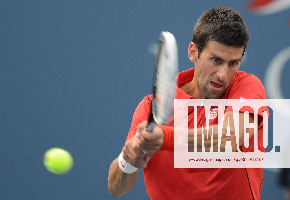 NEW YORK, Sept. 3, 2013 (Xinhua) -- Novak Djokovic of Serbia returns a shot during the men s singles fourth round match at the 2013 US Open tennis championships in New York, the United States, on Sept. 3, 2013. OPEN