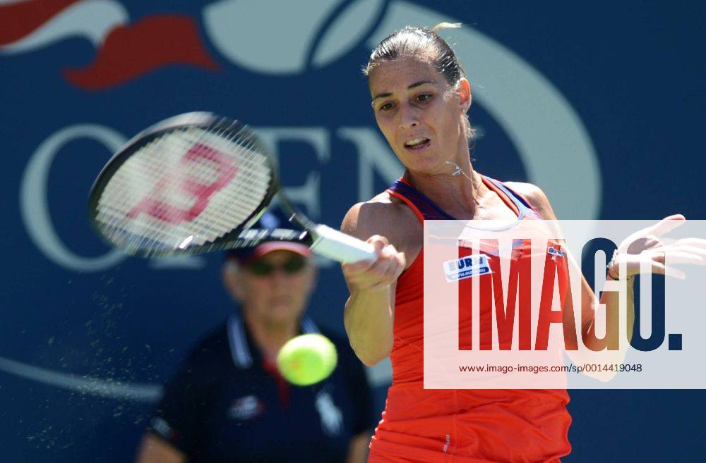 NEW YORK, Sept. 4, 2013 -- Flavia Pennetta of Italy returns a shot during her women s singles quarterfinal match during the U.S. Open tennis championships in New York, the United States