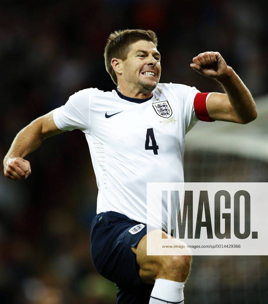 Steven Gerrard of England celebrates scoring during the FIFA 2014 World Cup Qualifying Group H match between England and Moldova at Wembley Stadium in London, Britain on Sept. 6, 2013. England won 4-0.(Xinhua Wang Lili) (SP)BRITAIN-LONDON-SOCCER-FIFA 2014 WORLD CUP QUALIFIER-ENGLAND VS MOLDOVA