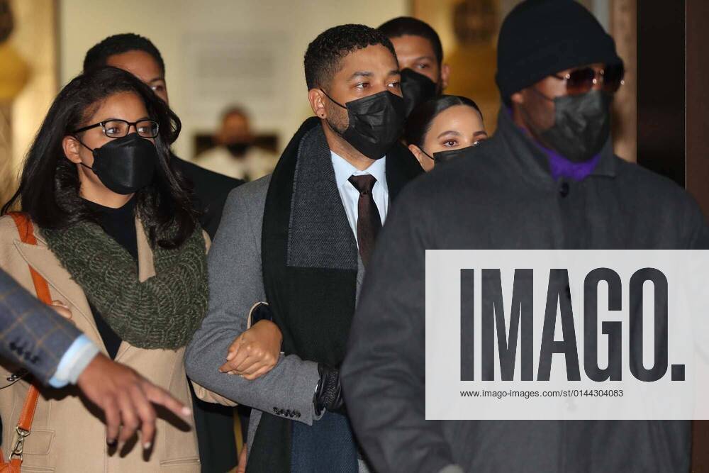 Jussie Smollett, middle, leaves the Leighton Criminal Court Building in Chicago after being found guilty on five of six charges in his criminal trial on Thursday, Dec. 9, 2021. - ZUMAm67_ 20211209_zaf_m67_033