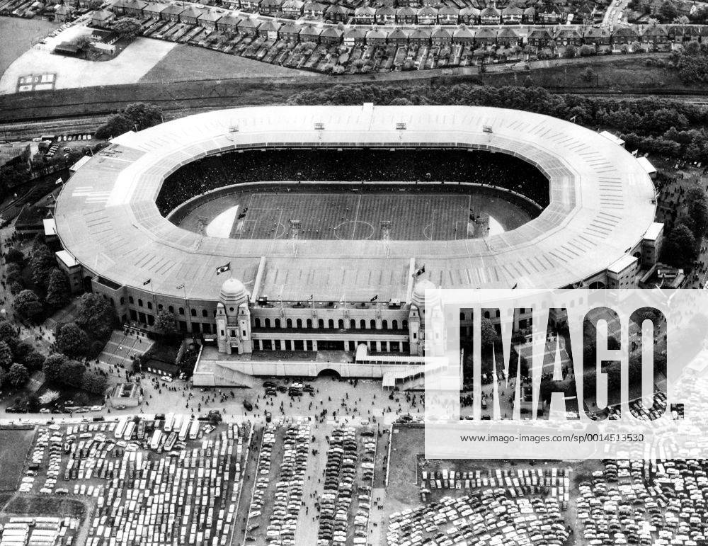 Aerial view of Wembley Stadium showing the newly erected roof which protects the spectators. 1966. UnitedArchives00575550