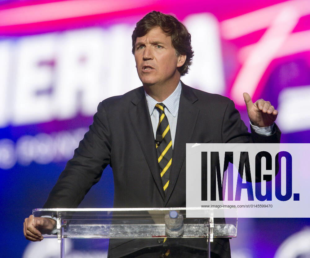 Phoenix, Arizona, USA - Fox News host TUCKER CARLSON speaks at AmericaFest, a Turning Point USA event. Phoenix USA - ZUMAce6_ 20211219_zaf_ce6_013