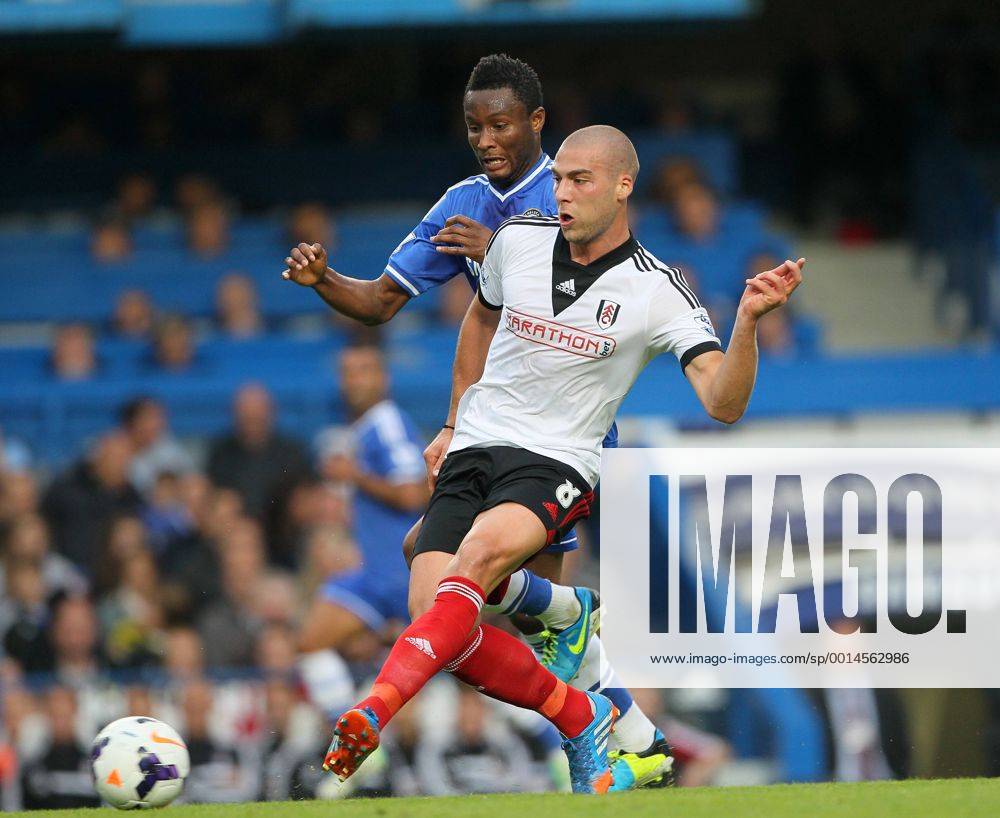Chelsea s Mikel tussles with Fulham s Pajtim Kasami Chelsea FC London v FC Fulham - Barclays Premier League- Stamford Bridge - London - England -21 09 2013 - .