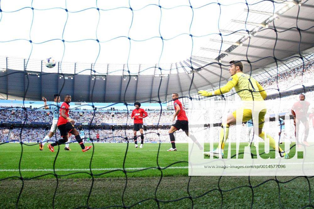 Sergio Kun Aguero of Manchester City scores the opening goal - Manchester City vs Manchester United - Barclay s Premier League - Etihad Stadium - Manchester - 22 09 2013 .