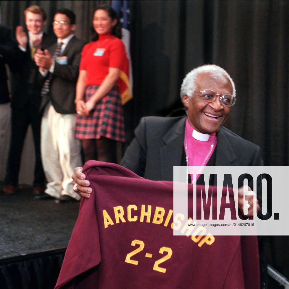 Archbishop DESMOND TUTU, the Nobel Peace Prize-winning Anglican cleric whose good humor, inspiring message and conscientious work for civil and human rights made him a revered leader during the struggle to end apartheid in his native South Africa, has died. He was 90. FILE PHOTO SHOT ON: April 13, 2000, Cuyahoga Falls, Ohio, USA: Archbishop DESMOND TUTU received a sweatshirt from Walsh Jesuit High School students in , Ohio after a speech to the student body. Cuyahoga Falls USA - ZUMAm67_ 20000413_mda_m67_013