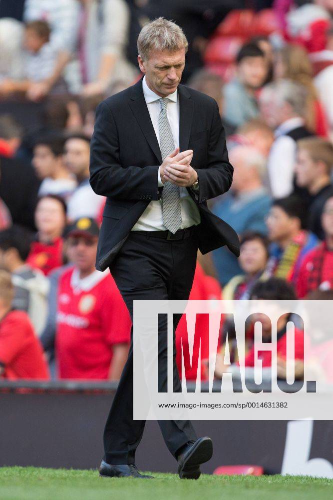David Moyes, manager of Manchester United trudges off looking thoughtful - Manchester United vs. West Bromwich Albion - Barclay s Premier League - Old Trafford - Manchester - 28 09 2013 Pic Philip Oldham Sportimage .