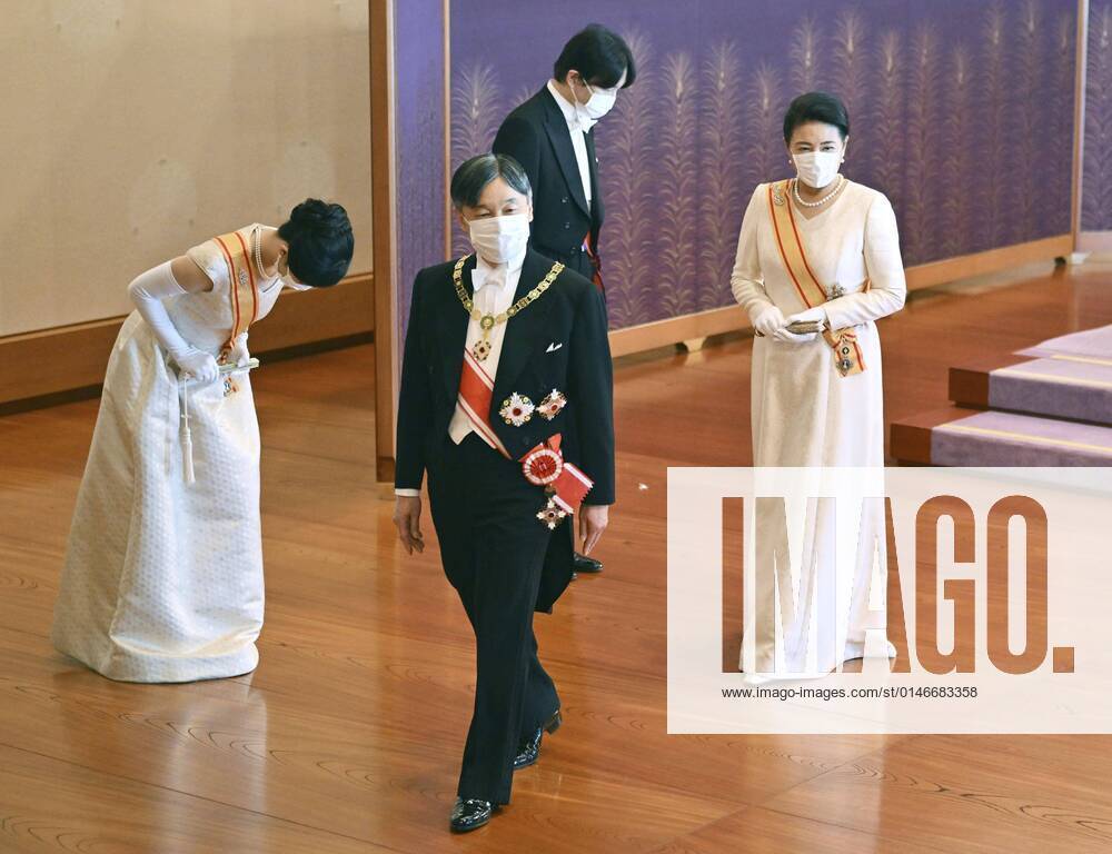 New Year ceremony by Japan s imperial family Japanese Emperor Naruhito (front, L) and Empress Masako (front, R) are pictured after attending a scaled-down New Year s ceremony at the Imperial Palace in Tokyo on Jan. 1, 2022, wearing masks for protection against the coronavirus. (Pool photo) A14AA0001175250P