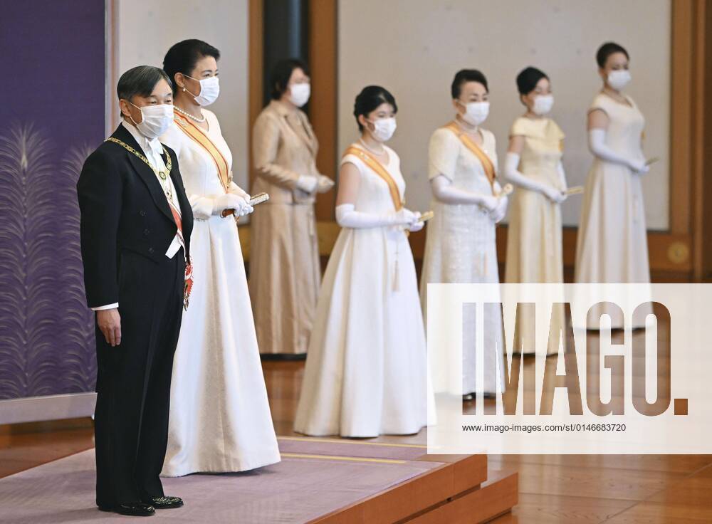 New Year ceremony by Japan s imperial family Japanese Emperor Naruhito (L) and Empress Masako (2nd from L) attend a scaled-down New Year s ceremony at the Imperial Palace in Tokyo on Jan. 1, 2022, wearing masks for protection against the coronavirus. (Pool photo) A14AA0001175252P